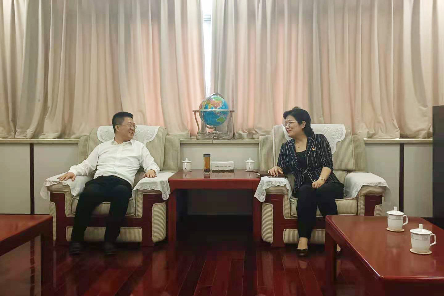 刘冬与徐州市新盛集团董事长林斌会谈